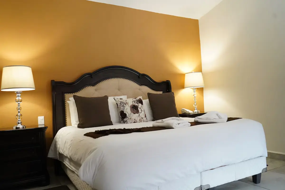 Elegant guest room at Hotel Casa Don Quijote